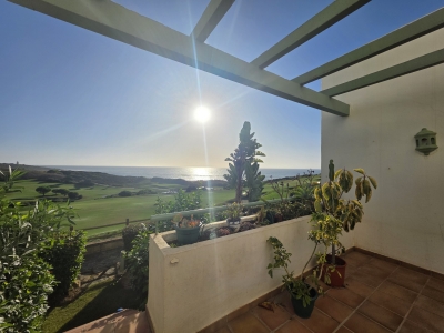 Apartamento en Primera Línea de Golf y Playa